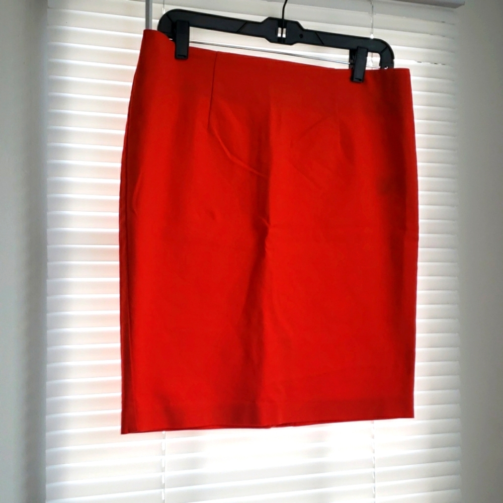 Bright orange/red skirt